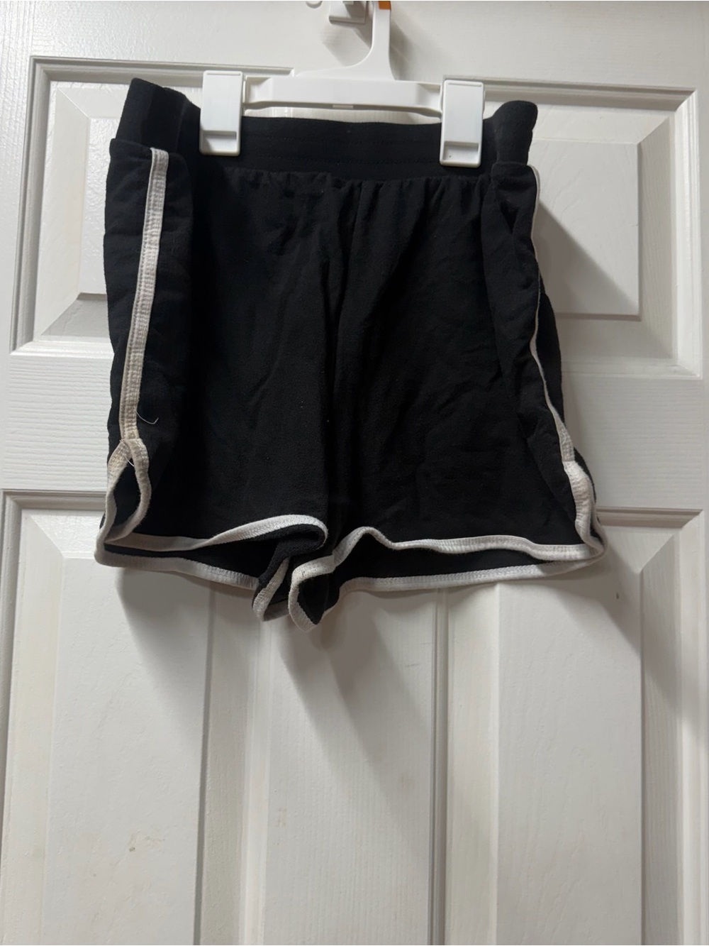 No Boundaries Black Athletic Shorts with White Trim has stains